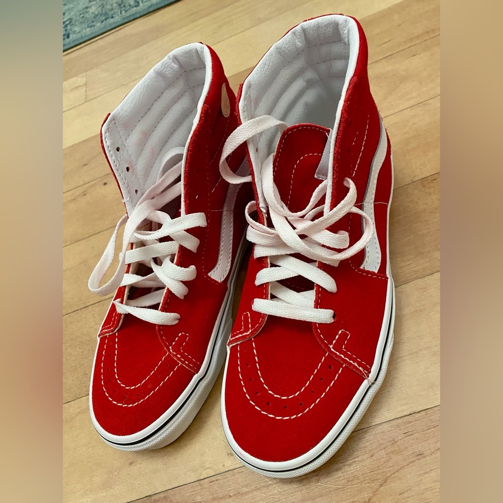 Vans.  Mens 5.  Woman’s 6.5.  Red high top new w/o box.